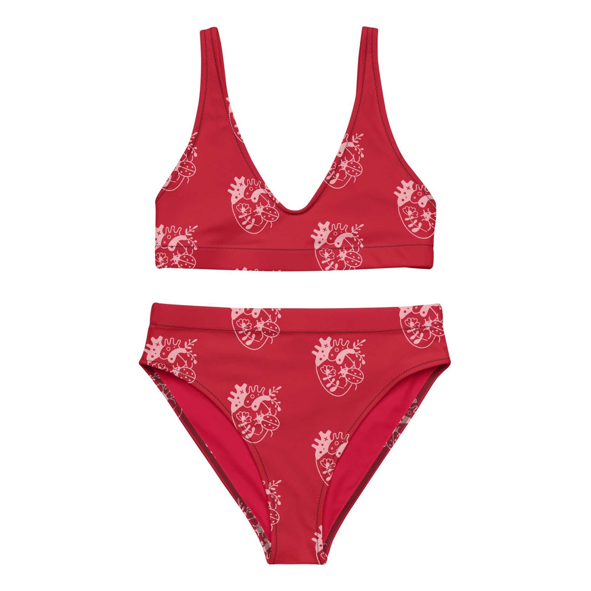 High-waisted bikini in red with a white repeating decorative print, featuring a scoop-neck top and high-rise bottoms